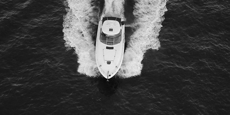 Boat speeding across the sea