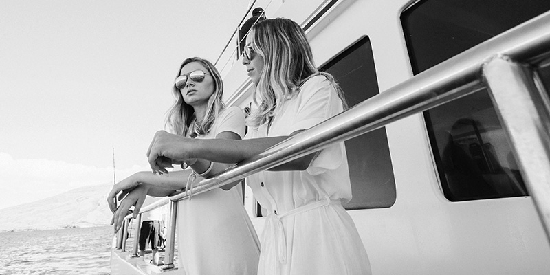 Two woman taking a luxury yacht trip