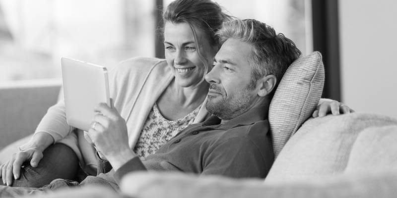 Couple looking at tablet